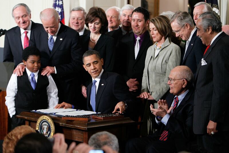 articles/2012/03/22/you-can-t-fix-medicaid-by-making-it-bigger/aca-signing_kks8fc