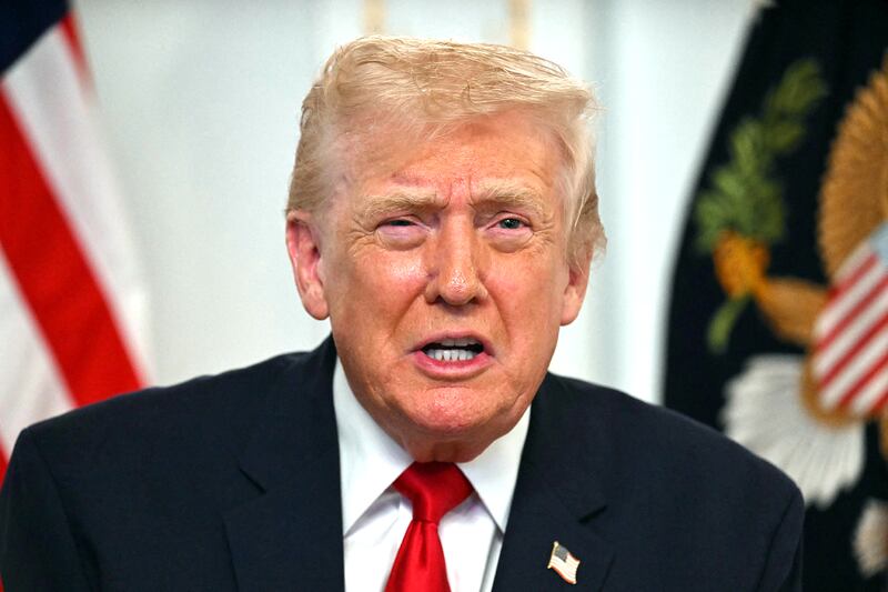 President Donald Trump participates in a video call with service members from his Mar-a-Lago residence in Palm Beach, Florida, on Nov. 27, 2025, during the Thanksgiving holiday. Trump said Thursday that Sarah Beckstrom, one of the two National Guard troops shot a day earlier near the White House, had died, while the other soldier was "fighting for his life."