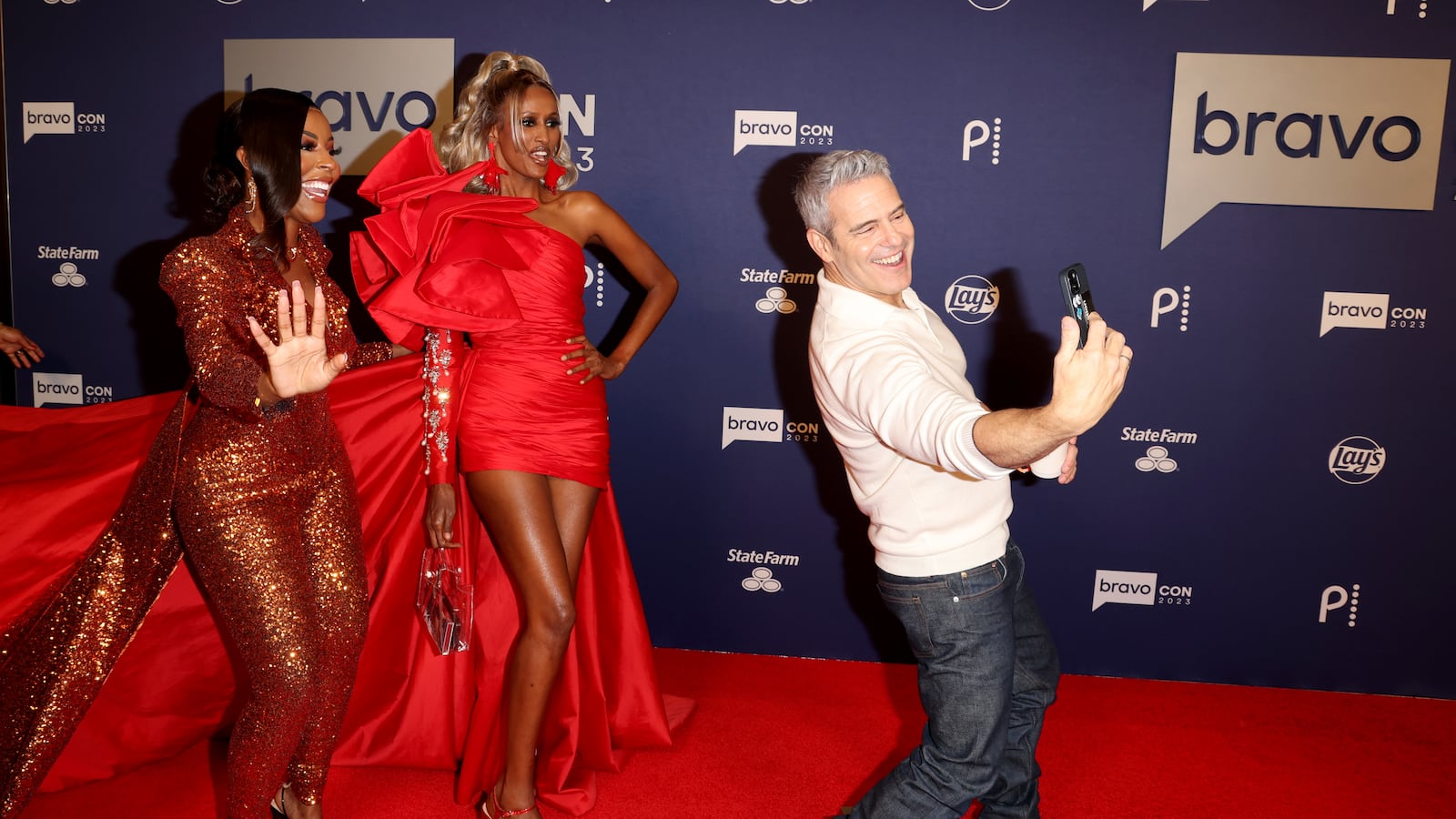 Caroline Brooks, Chanel Ayan of The Real Housewives of Dubai television series and Andy Cohen at BravoCon