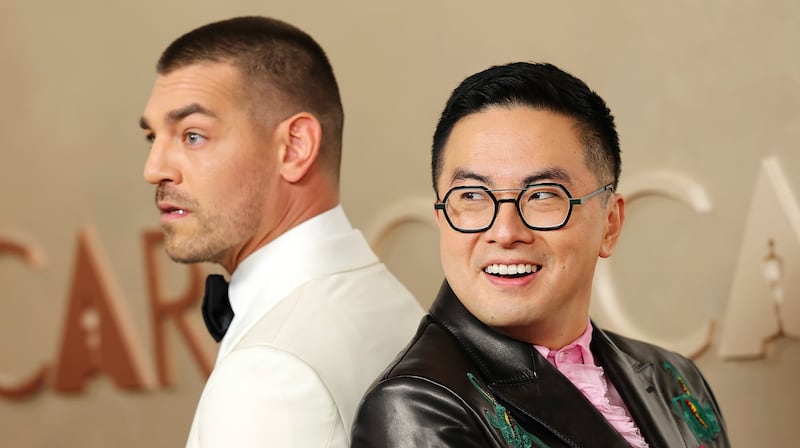 HOLLYWOOD, CALIFORNIA - MARCH 02: (L-R) Matt Rogers and Bowen Yang attend the 97th Annual Oscars at Dolby Theatre on March 02, 2025 in Hollywood, California. (Photo by Arturo Holmes/WireImage)