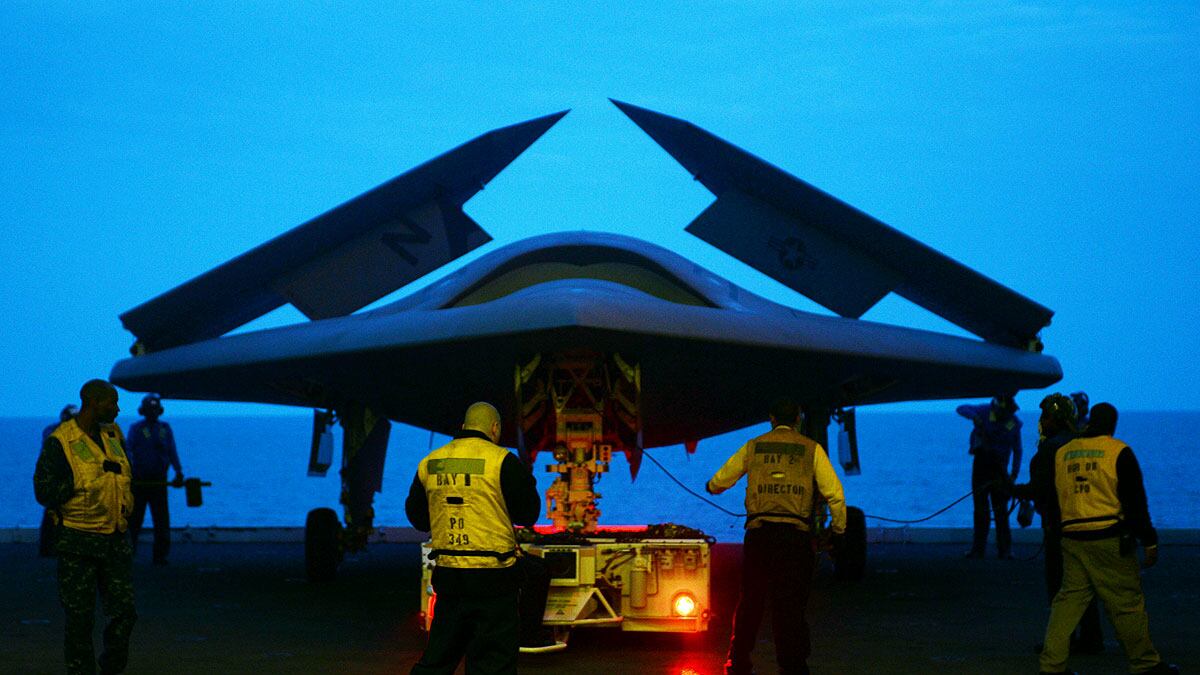 articles/2013/05/30/the-pros-and-cons-of-killer-robots/killer-war-robots-cheat_vtv1da