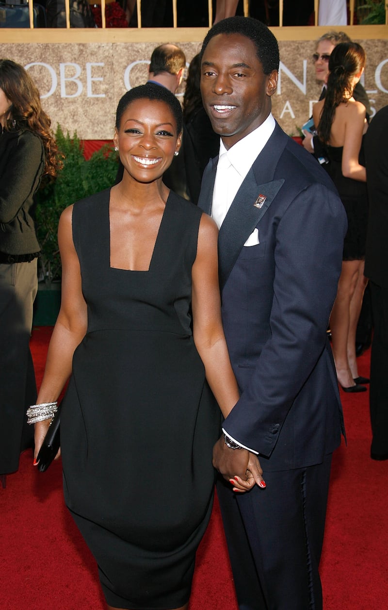 Actor Isaiah Washington and wife Jenisa arrive at the 64th Annual Golden Globe Awards at the Beverly Hilton on January 15, 2007 in Beverly Hills, California.