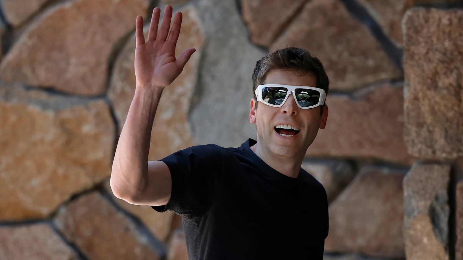 CEO of OpenAI Sam Altman wearing sunglasses at the Allen & Company Sun Valley Conference on July 8, 2025 in Sun Valley, Idaho. Every year, some of the world's wealthiest and most powerful figures from the media, finance, technology, and political spheres converge at the Sun Valley Resort for the exclusive week-long conference hosted by boutique investment bank Allen & Co.