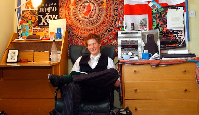 ETON, UNITED KINGDOM - JUNE 06:  Prince Harry Sits In His Bedroom At Eton College.  Within Limits, Student Are Allowed To Decorate Their Room Themselves. At Typical Student Room He Has A Stereo Music Sound System, Posters And On His Desk A Photograph Of His Mother Diana.  This Is One Of A Series Of Picture Released Ahead Of The Prince Completing His Studies At Eton Boarding School.  (Photo by Tim Graham Picture Library/Getty Images)