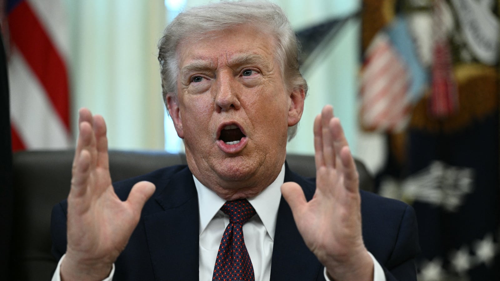 US President Donald Trump speaks after signing an executive order in the Oval Office of the White House in Washington, DC, on March 31, 2026. (Photo by Brendan SMIALOWSKI / AFP via Getty Images)
