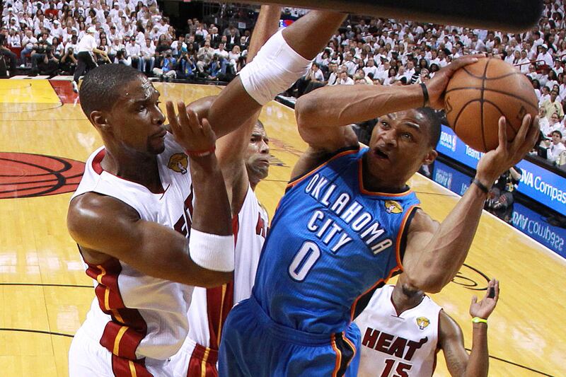 articles/2012/06/22/lebron-james-and-miami-heat-throttle-okc-thunder-to-win-2012-nba-championship/nba-wrap-up-singal_fja6ck
