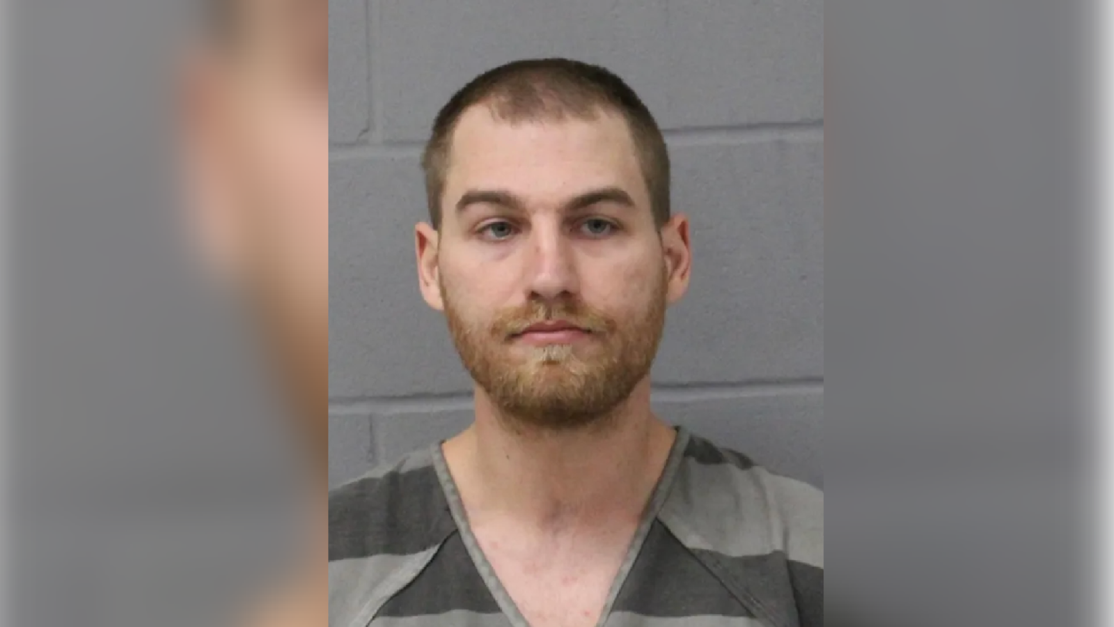 Paul Ryan Overeem stares forward in a mugshot.