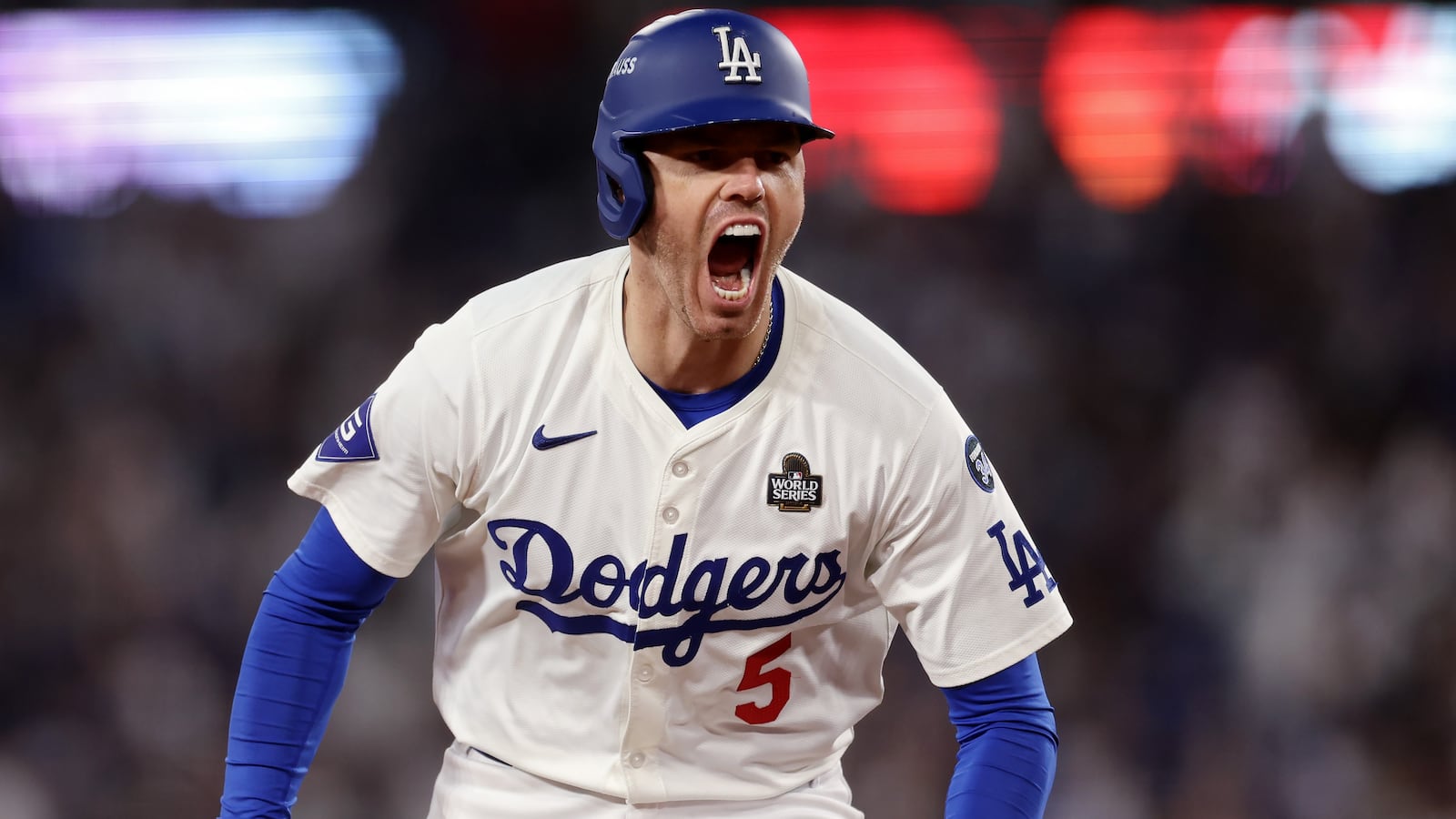 Freddie Freeman #5 of the Los Angeles Dodgers celebrates after hitting a walk-off grand slam during the 10th inning against the New York Yankees