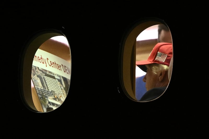 US President Donald Trump is seen aboard Air Force One checking a Kennedy Center large printout after landing at Joint Base Andrews, Maryland on September 16, 2026. Trump, who is returning from Gastonia, North Carolina after campaigning for Republican US Senate candidate Michael Whatley, threatened on September 15, 2026 to keep the Kennedy Center closed for good.