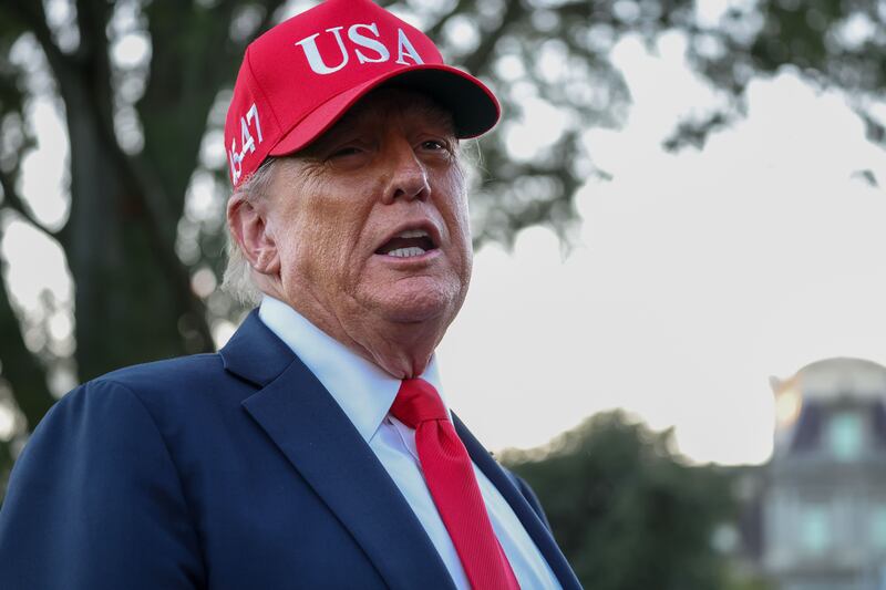 President Donald Trump talks to the media after walking off Marine One on the South Lawn of the White House on October 05, 2025 in Washington, DC.