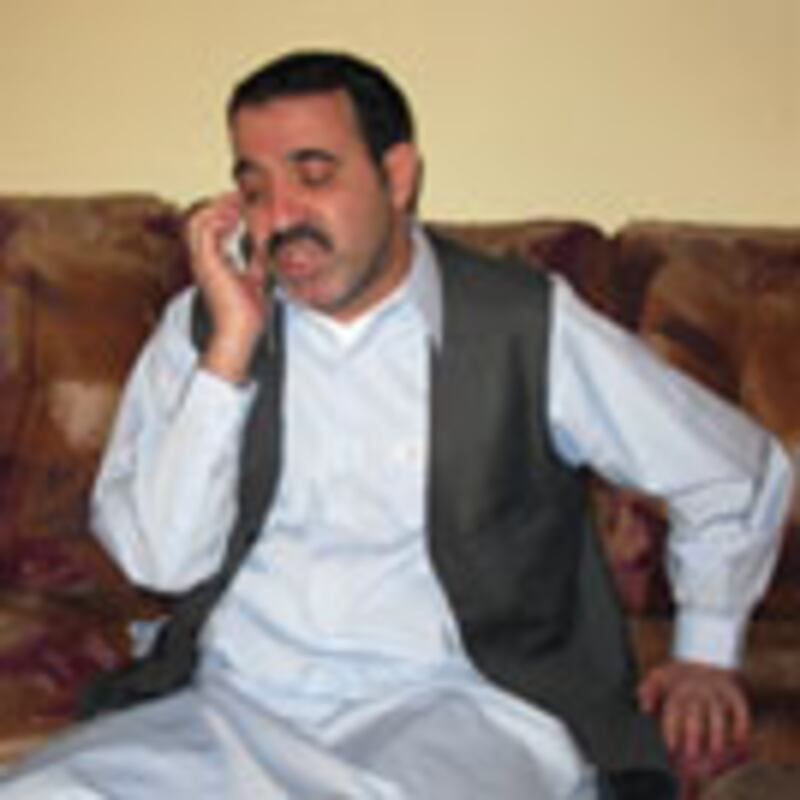 articles/2009/12/30/our-hottest-stories-of-2009/posner-ahmed-karzai_59004_whyrut