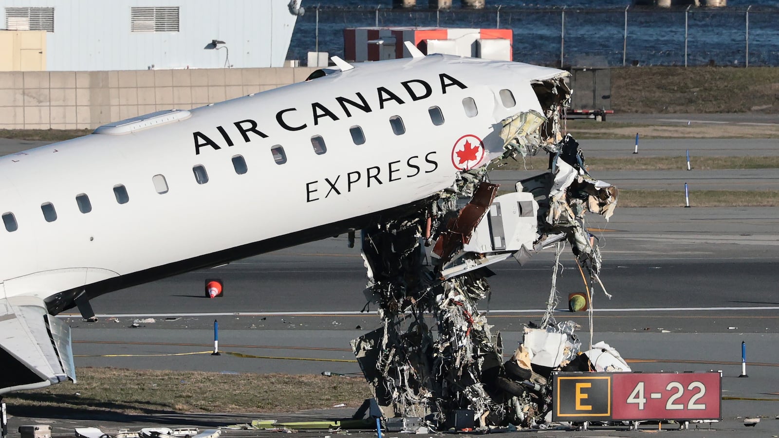 NEW YORK, NEW YORK - MARCH 24: An Air Canada Express CRJ-900 sits on the runway after colliding with a Port Authority fire truck at LaGuardia Airport on March 24, 2026 in New York City. Flights into and out of LaGuardia airport have resumed after an Air Canada Express plane flight from Montreal collided with a fire truck on the tarmac killing the pilot as well as the co-pilot and leaving more than forty people injured. (Photo by Michael M. Santiago/Getty Images)