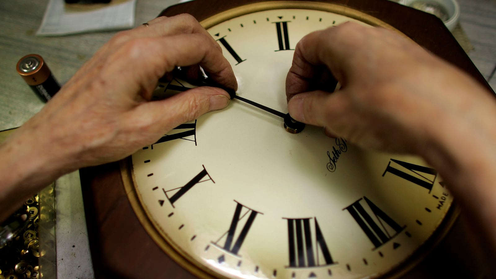 Howard Brown repairs a clock at Brown?s Old Time Clock Shop March 6, 2007 in Plantation, Florida. This year day light savings time happens three weeks early and some people fear that it could cause some computer and gadget glitches.