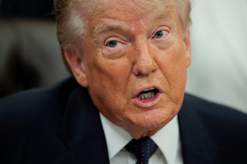 President Donald Trump speaks during an event to sign a memorandum in the Oval Office at the White House in Washington, D.C., U.S., May 5, 2026.
