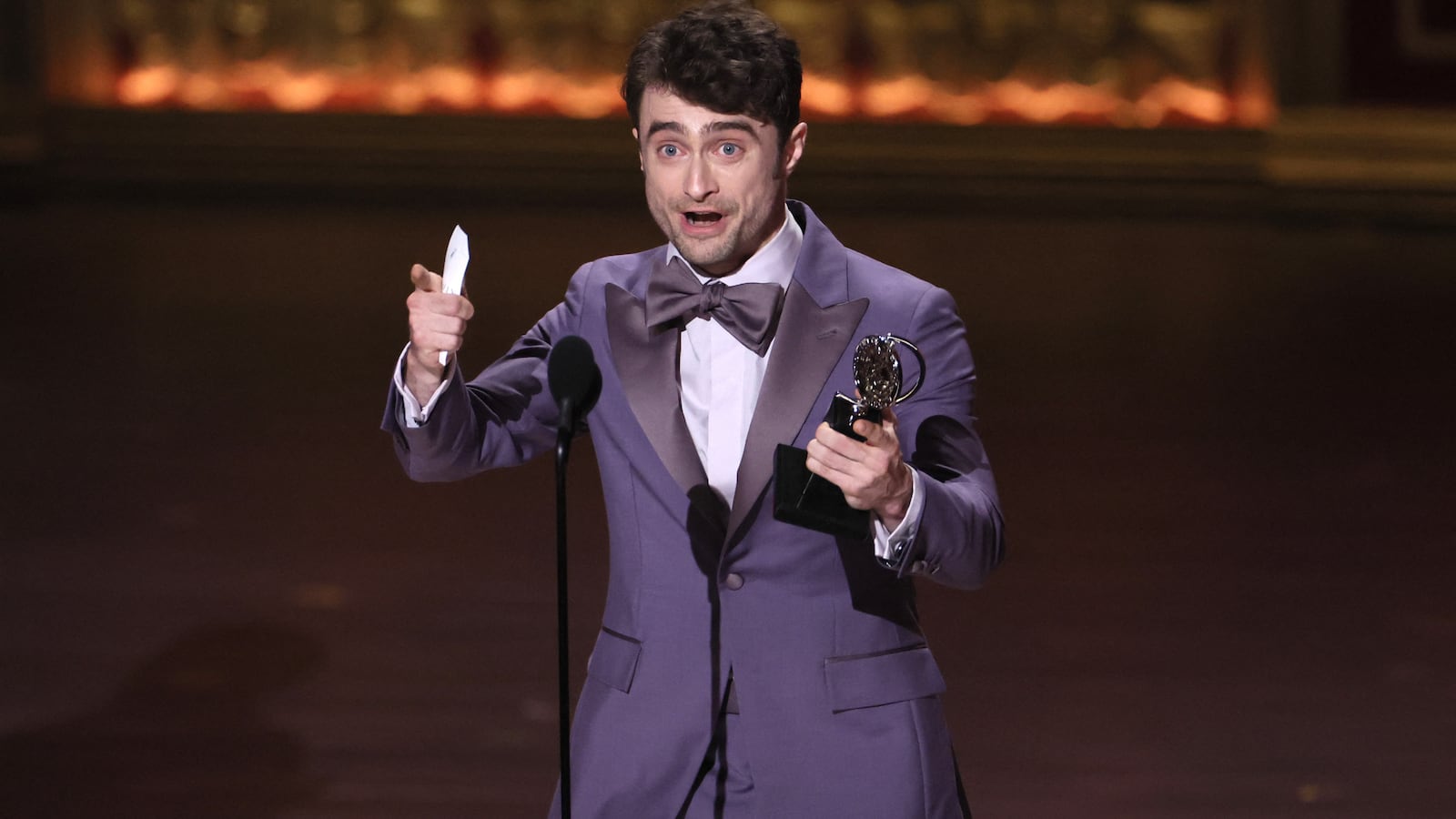 Daniel Radcliffe accepts the award for Best Performance by an Actor in a Featured Role in a Musical for "Merrily We Roll Along" at the 77th Annual Tony Awards in New York City, U.S., June 16, 2024.
