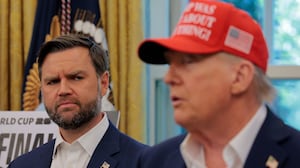 WASHINGTON, DC - AUGUST 22: Vice President JD Vance looks at U.S. President Donald Trump as he talks in the Oval Office August 22, 2025 in Washington, DC. Trump announced the FIFA World Cup 2026 draw will take place at The Kennedy Center. (Photo by Chip Somodevilla/Getty Images)