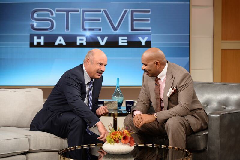 Dr. Phil and Steve Harvey in 2014.