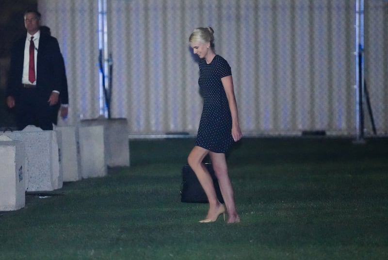 U.S. President Donald Trump's executive assistant Natalie Harp walks after disembarking Marine One, as Trump returns following a visit to North Carolina, at the Ellipse near the White House in Washington, D.C., U.S., September 16, 2026.