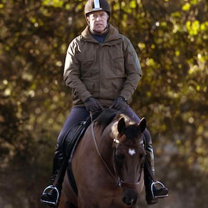 Andrew Mountbatten-Windsor, formerly Prince Andrew The Duke of York, is seen on December 13, 2025 horseback riding on the grounds of Windsor Castle in Windsor, UK.