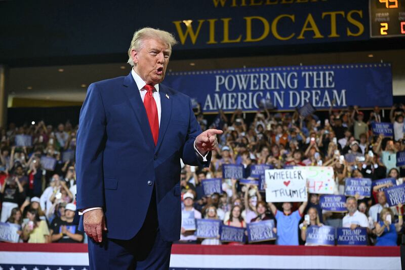 President Donald Trump arrives to speak at Wheeler High School in Marietta, Georgia, on July 22, 2026.
