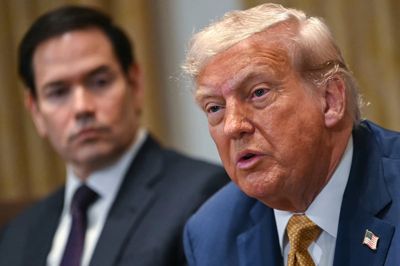 TOPSHOT - US President Donald Trump speaks as Secretary of State Marco Rubio (L) looks on during a cabinet meeting in the Cabinet Room of the White House in Washington, DC, on July 8, 2025. (Photo by ANDREW CABALLERO-REYNOLDS / AFP) (Photo by ANDREW CABALLERO-REYNOLDS/AFP via Getty Images)