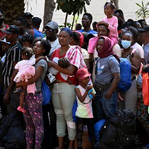 Migrants, mostly Haitians, wait to be sent to different migration centers in Puebla, Hidalgo, and Queretaro to obtain their humanitarian visas.