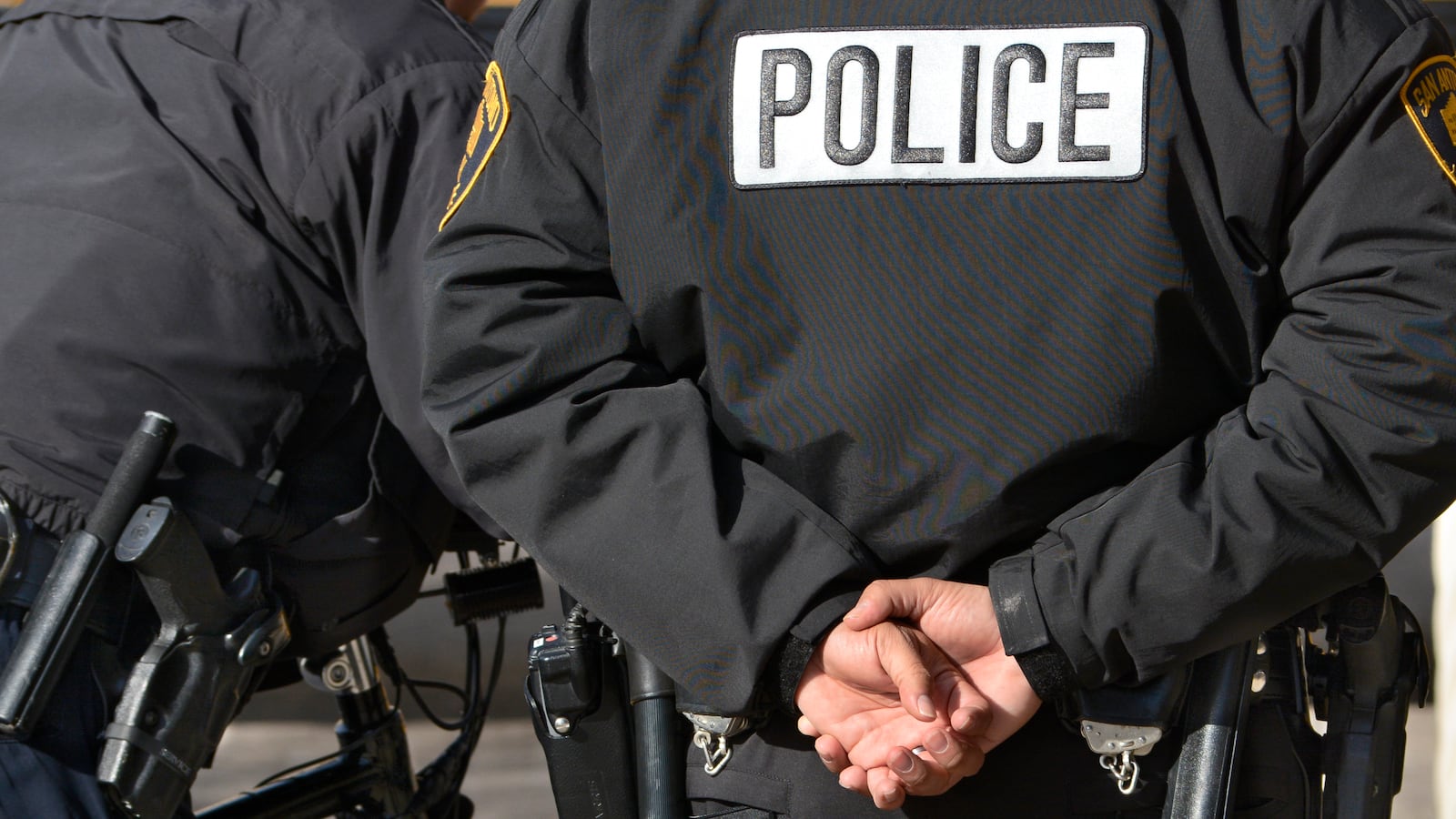 Police officers standing at attention.