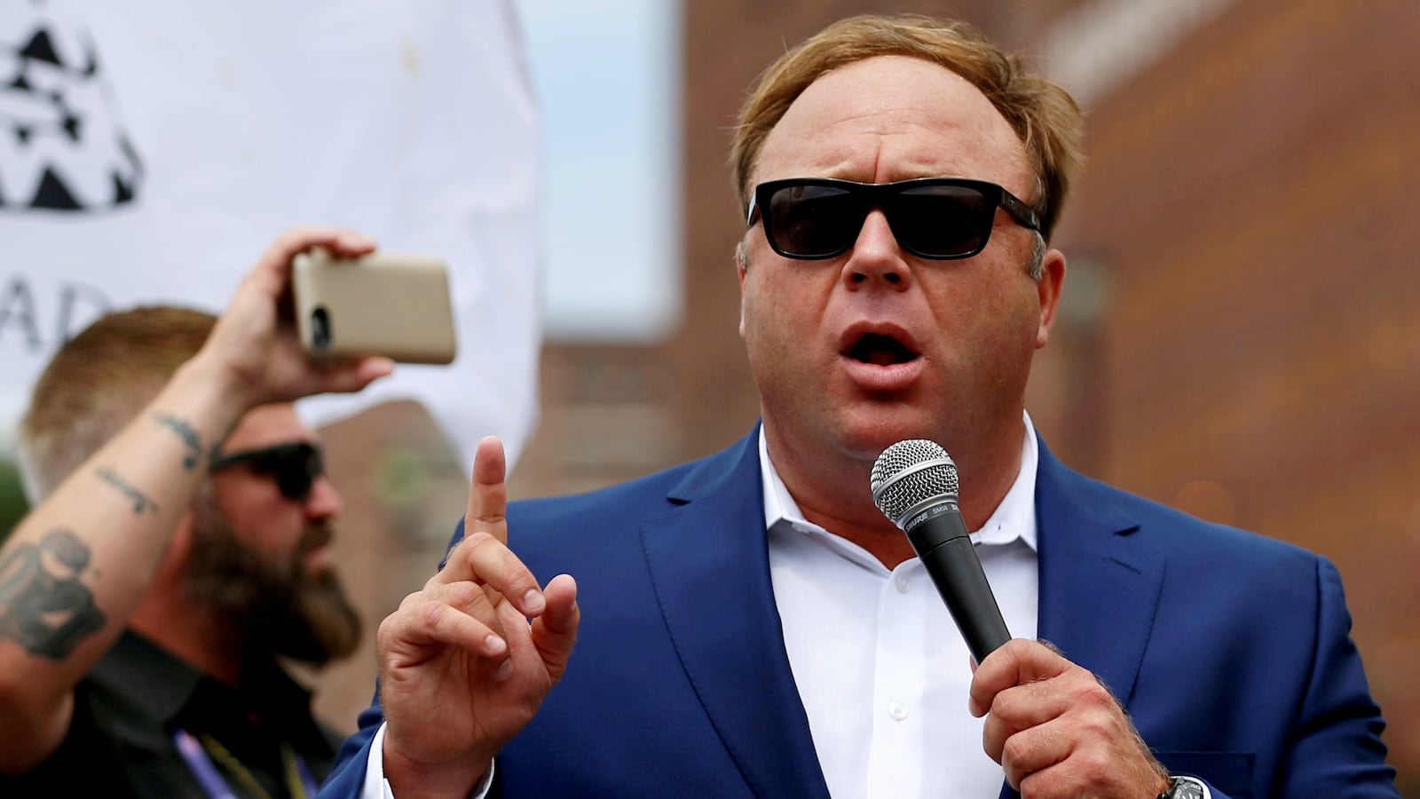 180814-alex-jones-twitter-suspension-cheat_a5i1l1