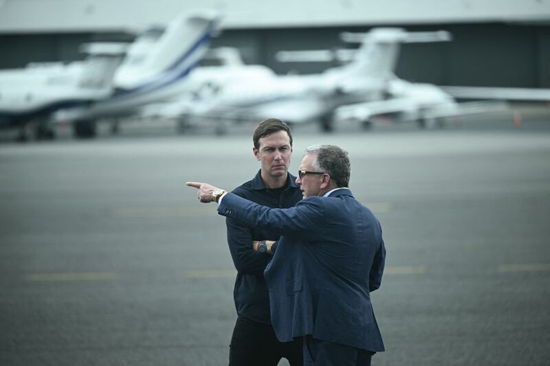 US special envoy to the Middle East Steve Witkoff (R) and Jared Kushner await the arrival of President Donald Trump and First Lady Melania Trump at Teterboro Airport in Teterboro, New Jersey, from where they will motorcade to attend the 2025 FIFA Club World Cup final football match between England's Chelsea and France's Paris Saint-Germain at MetLife Stadium in East Rutherford, New Jersey, on July 13, 2025. (Photo by Brendan SMIALOWSKI / AFP) (Photo by BRENDAN SMIALOWSKI/AFP via Getty Images)