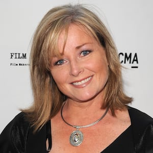 Picture of Beverly Thomson on a red carpet.