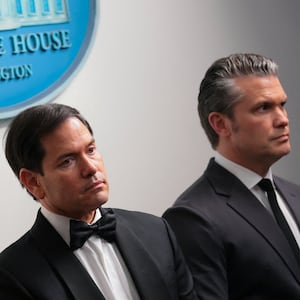 U.S. Secretary of Defense Pete Hegseth and U.S. Secretary of State Marco Rubio look on as U.S. President Donald Trump holds a press briefing at the White House, following a shooting incident during the annual White House Correspondents’ Association dinner, in Washington, D.C., U.S., April 25, 2026.