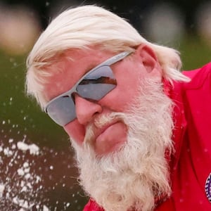 Dec 17, 2022; Orlando, Florida, USA; John Daly hits from a green side bunker on the 18th hole during the first round of the PNC Championship golf tournament at Ritz Carlton Golf Club Grande Lakes Orlando Course. Mandatory Credit: Reinhold Matay-USA TODAY Sports
