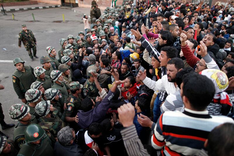 articles/2012/12/09/morsi-and-the-military-egypt-president-firm-on-constitution-vote/egypt-morsi-military-state-giglio-tease_h5afov