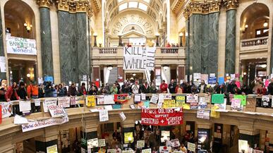 cheats/2011/03/18/wisconsin-judge-blocks-new-labor-law/wisconsin-standoff_az8v09