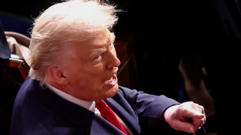 FILE PHOTO: U.S. President Donald Trump arrives to deliver the State of the Union address to a joint session of Congress in the House Chamber at the U.S. Capitol in Washington, D.C., U.S., February 24, 2026.  REUTERS/KEVIN LAMARQUE/File Photo