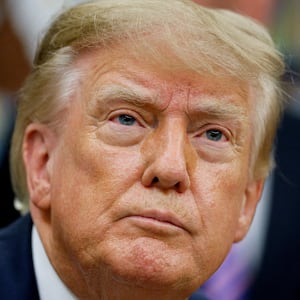 US President Donald J. Trump looks on as he makes an announcement on healthcare in the Oval Office at the White House in Washington, D.C., US, September 18, 2026. REUTERS/Evan Vucci      TPX IMAGES OF THE DAY