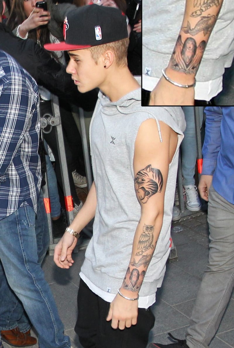 galleries/2013/05/02/justin-bieber-s-tattoos-a-selena-gomez-look-a-like-a-crown-jesus-ink-and-more/130429-justin-bieber-tattoos18_mqoksh