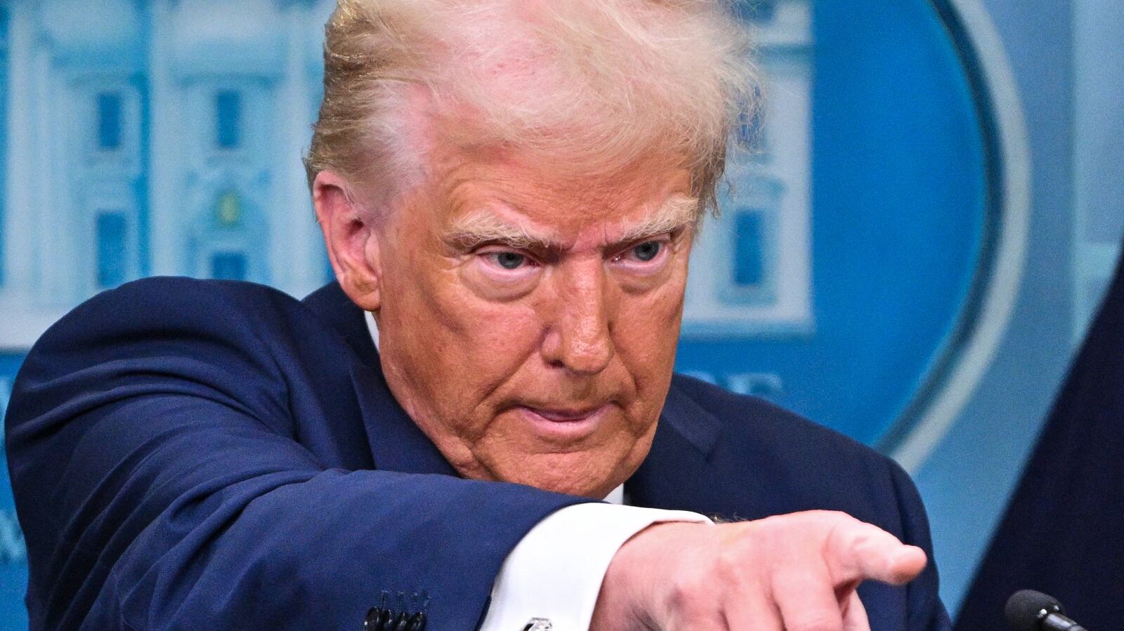 stump fingers pointing out which of the happy meals he wants