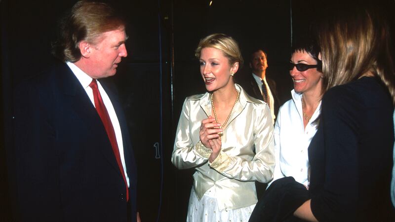 Donald Trump, Paris Hilton and Ghislaine Maxwell attend Anand Jon Fashion Show on September 18, 2000 in New York City.
