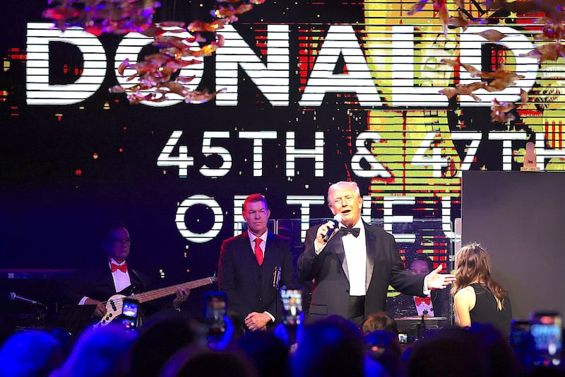 U.S. President Donald Trump speaks to guests during a New Year’s Eve event
