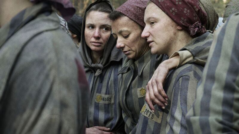 A photo including Anna Próchniak, Mili Eshet and Tallulah Haddon