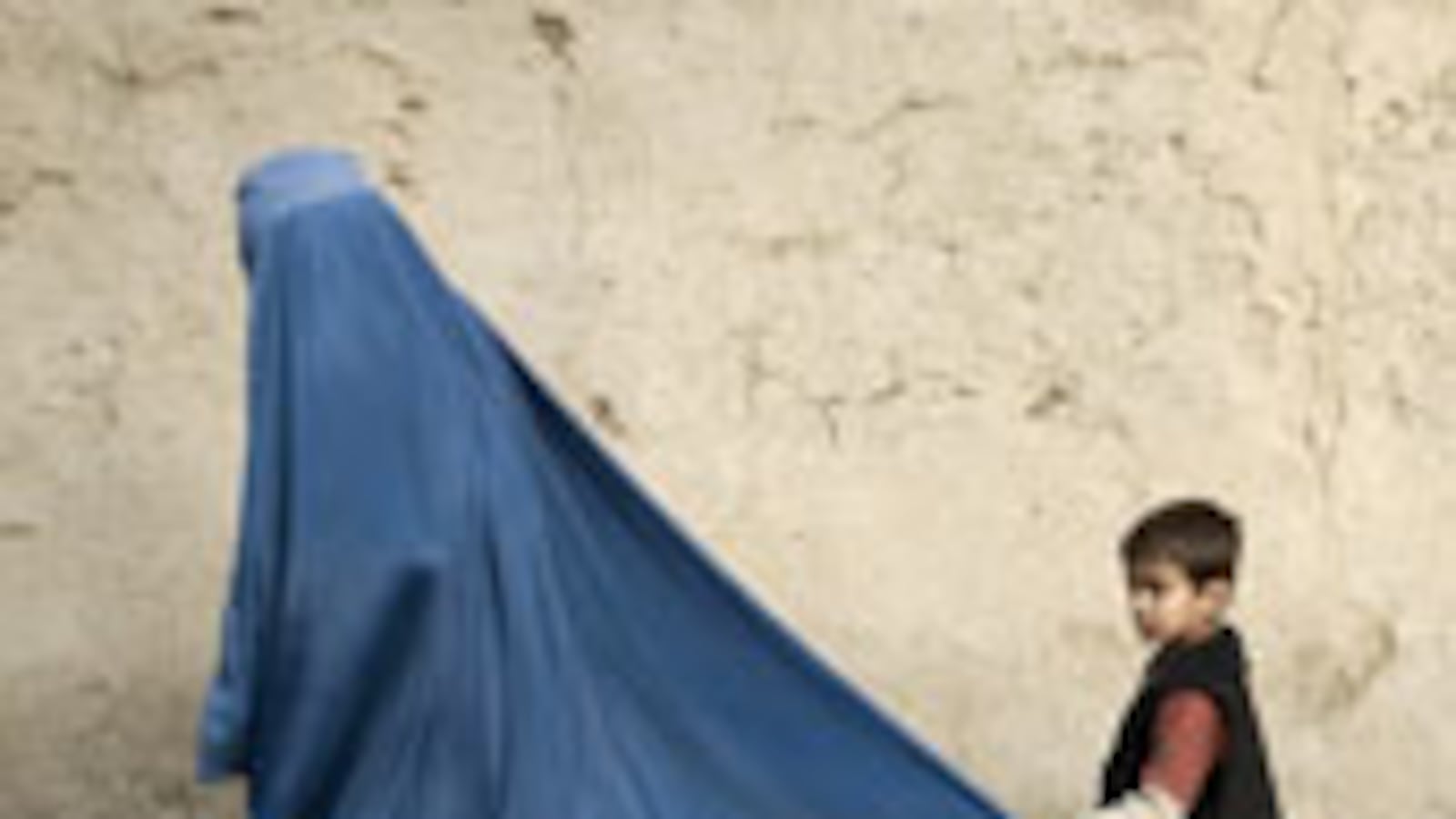 articles/2009/12/01/what-the-surge-means-for-women/lemmon-afghanistan-women_66461_smuyfg