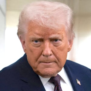 U.S. President Donald Trump speaks to reporters over the North Atlantic as he returns to Washington from the World Economic Forum (WEF) in Davos, Switzerland, aboard Air Force One, U.S., January 22, 2026.
