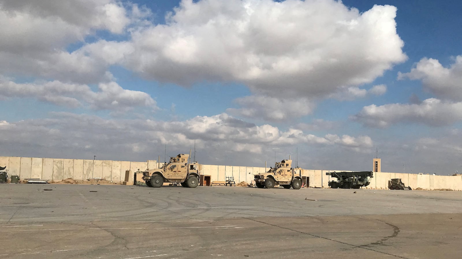 Military vehicles of U.S. soldiers are seen at the al-Asad air base in Anbar province, Iraq,