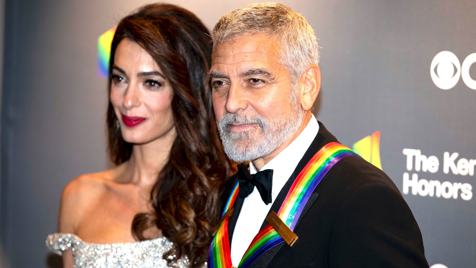 Amal Clooney and honoree George Clooney arrive on the red carpet of the 2022 Kennedy Center honors in Washington, D.C. on December 4, 2022.