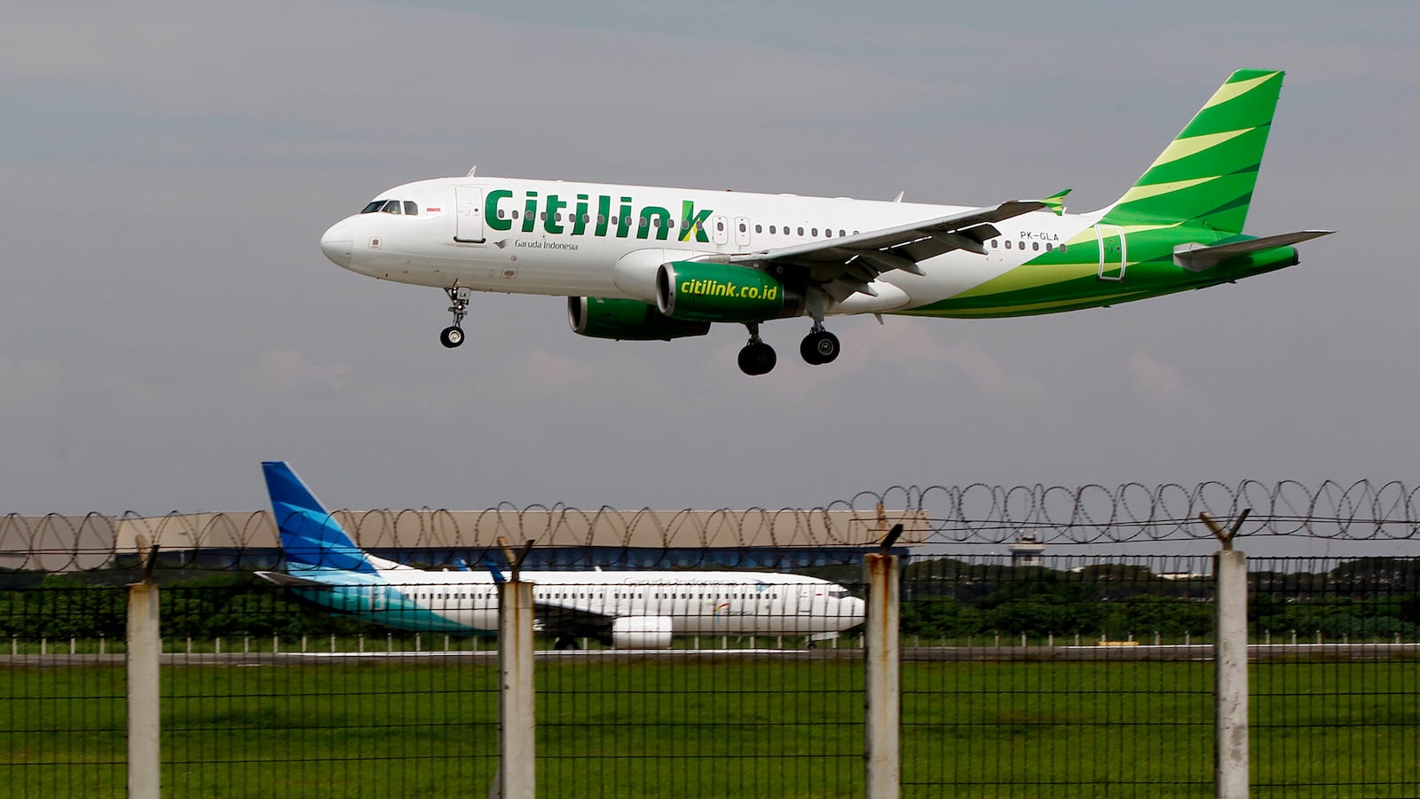 2013-06-14T120000Z_804915607_GM1E96E1C2L01_RTRMADP_3_INDONESIA-CITILINK_mehewl