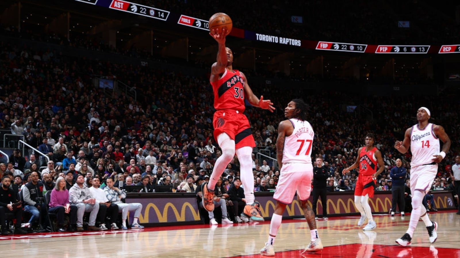 Ochai Agbaji of the Toronto Raptors shoots the ball during a game against the LA Clippers on February 2, 2025.