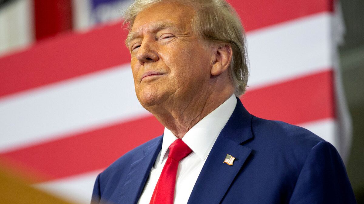 Former President Donald Trump speaks to a crowd of supporters at the Fort Dodge Senior High School on November 18, 2023