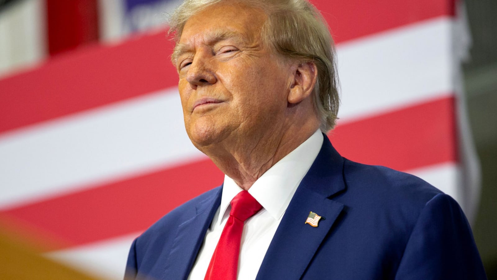 Former President Donald Trump speaks to a crowd of supporters at the Fort Dodge Senior High School on November 18, 2023