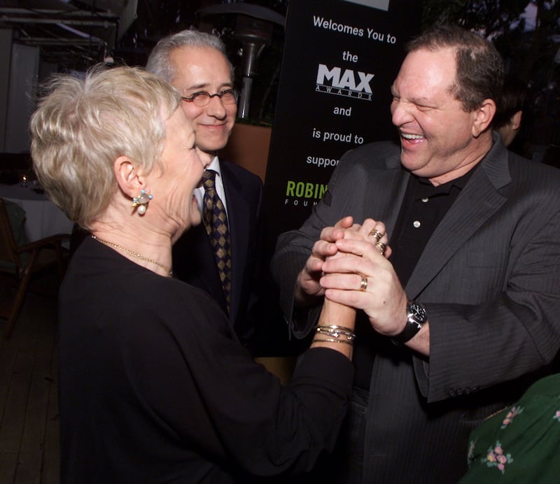 Dame Judi Dench and Harvey Weinstein at Miramax Films' pre-oscar party at the Mondrian Hotel in West Hollywood, Ca. Saturday, March 23, 2002.